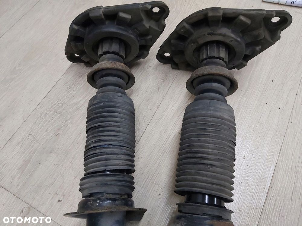 Nissan Primera P12 amortyzator tył lewy prawy komplet mcperson Magnum - 3