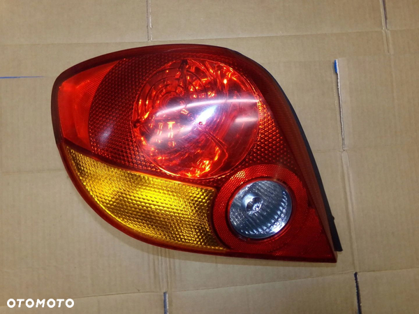 LAMPA LEWA TYŁ TYLNA HYUNDAI COUPE II 04R