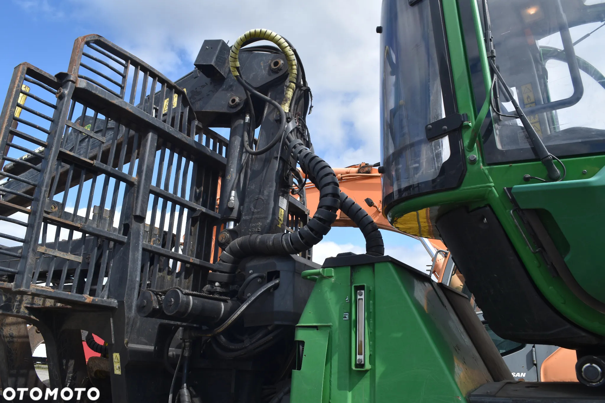 John Deere 1210E - 13