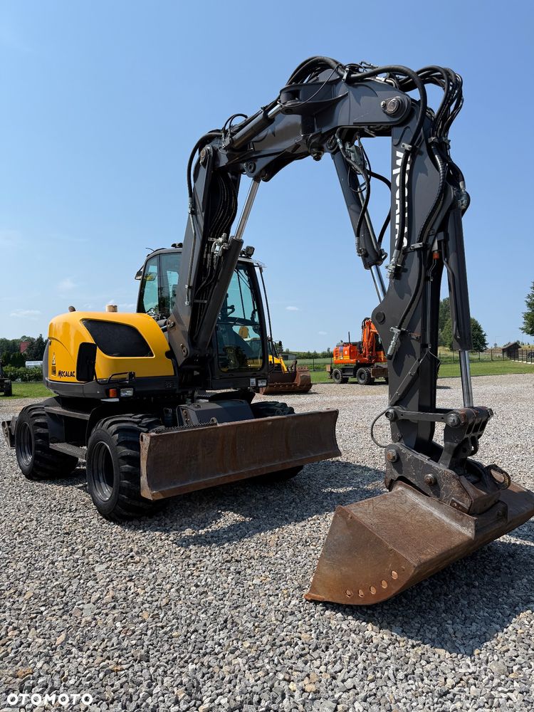 Mecalac 714 - 1