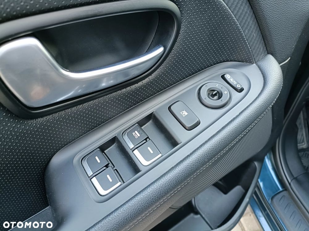 Kia Carens 2.0 GDI L - 13