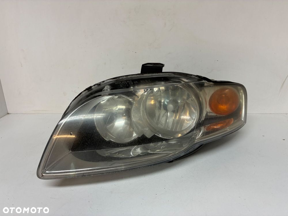 AUDI A4 B7 LAMPA PRZÓD PRZEDNIA LEWA  MIGACZ  EUROPA 8E0941003AJ