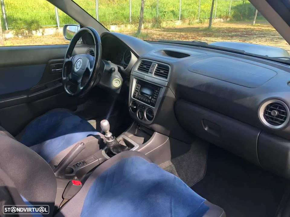 Subaru Impreza Sedan 2.0 WRX STi - 11