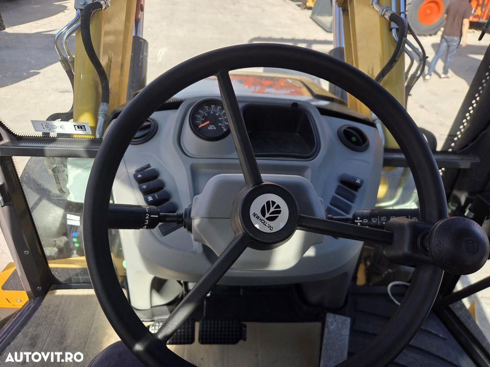 New Holland B110D NOU -nefolosit, FULL OPTION, Masa operatinoala 9,5 tone, motor 120CP euro6 cu Ad Blue, Certificat CE Atestat RAR, Cupa multifuncitonala 4x1, FURCI paleti, Brat excavare extensibil, anv MICHELIN, Aer cond, cutie POWERSHIFT, PROMOTIE 84900 EUR+T - 26