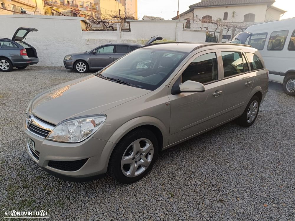 Opel Astra Caravan 1.3 CDTi Enjoy ecoFLEX - 1