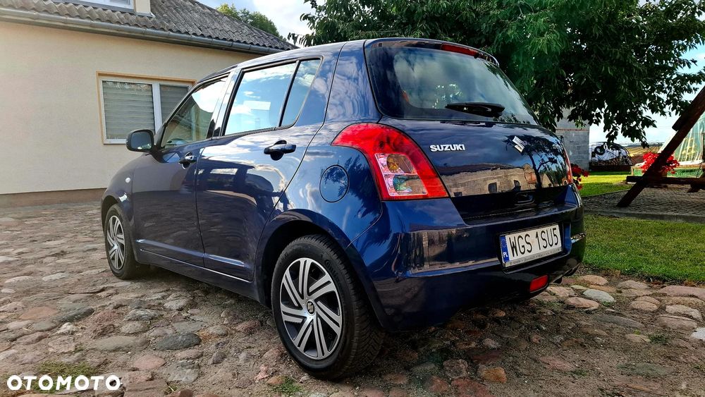 Suzuki Swift 1.3 Club - 9