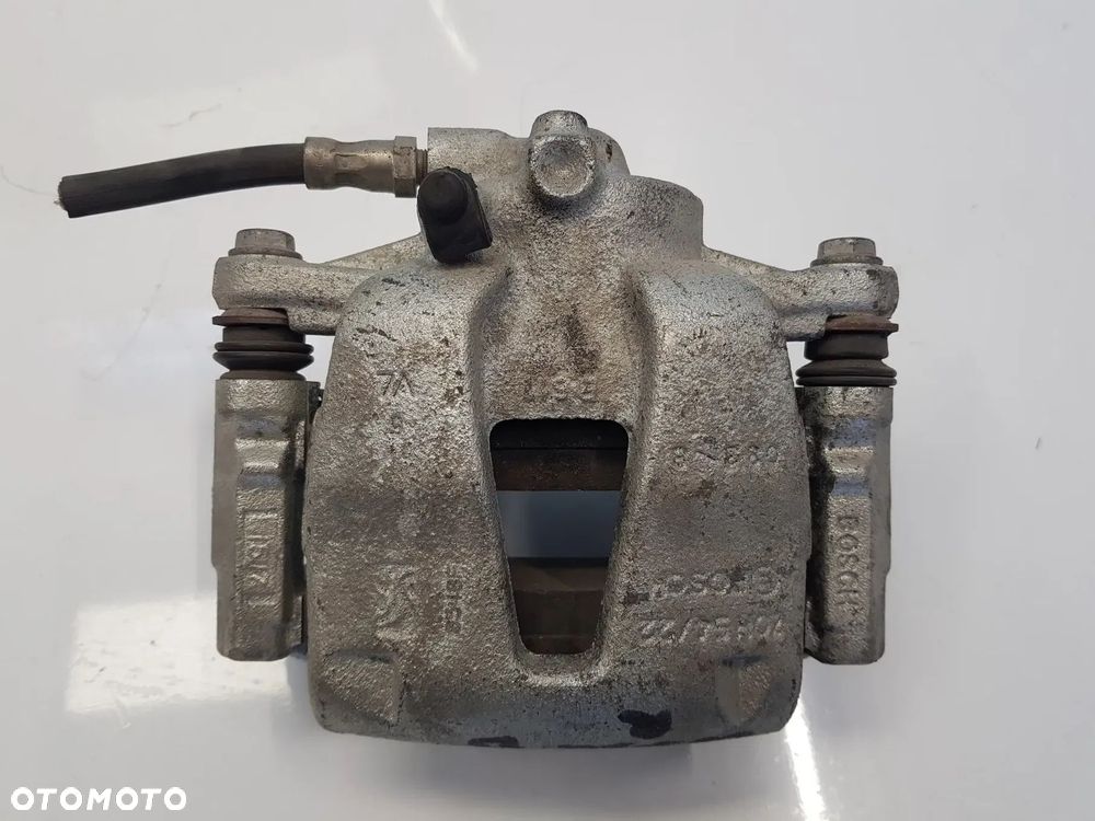 Zacisk hamulcowy jarzmo prawy przód OPEL CORSA D ADAM FIAT GRANDE PUNTO EVO PANDA 500 DOBLO FIORINO LINEA ALFA ROMEO MIT - 1