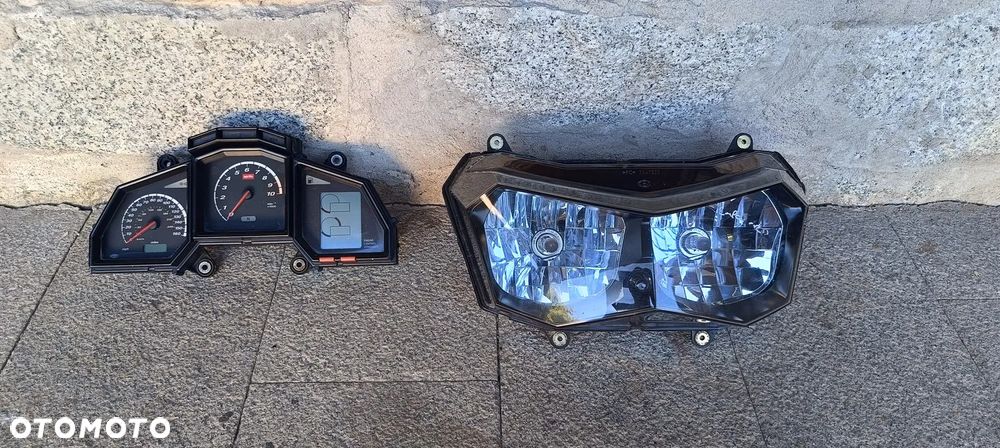 APRILIA ETV CAPONORD 1000 REFLEKTOR LAMPA LICZNIK ZEGARY 2004