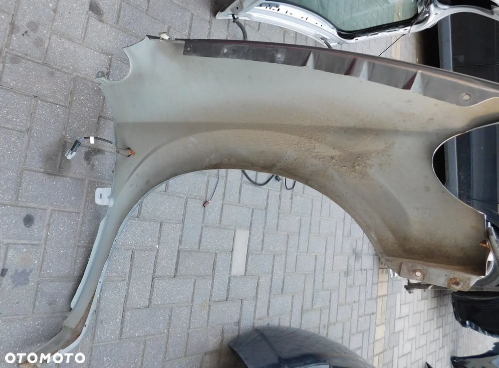 błotnik lewy przód CHRYSLER DODGE VOYAGER IV 00-08 - 8