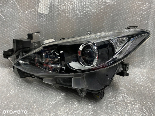 LAMPA LEWA SOCZEWKA MAZDA 3 III B45A-51040