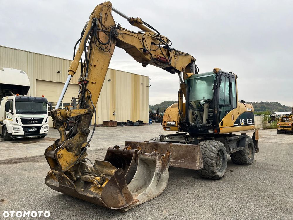 Caterpillar M313C - 1