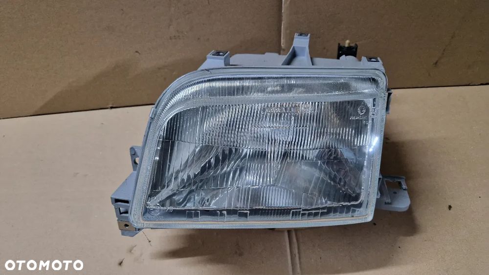 RENAULT CLIO I LAMPA PRZÓD LEWA NOWA CARELLO - 1