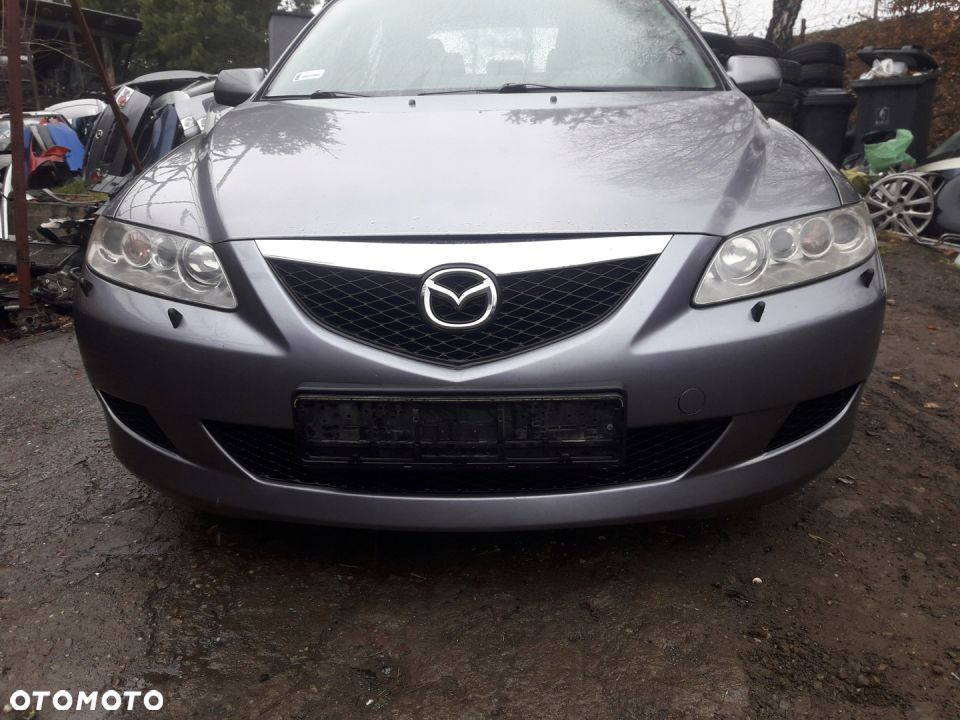 Mazda 6 02-07 Maska lampa zderzak pas atrapa 29Y - 1