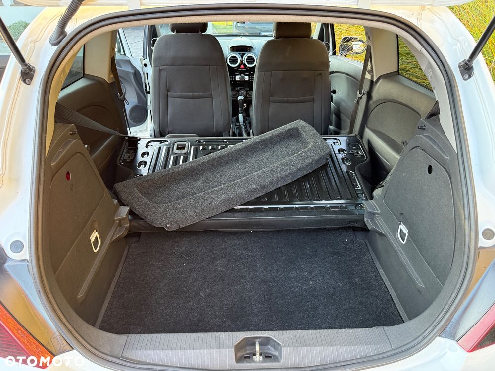 Opel Corsa 1.2 16V Cosmo - 19