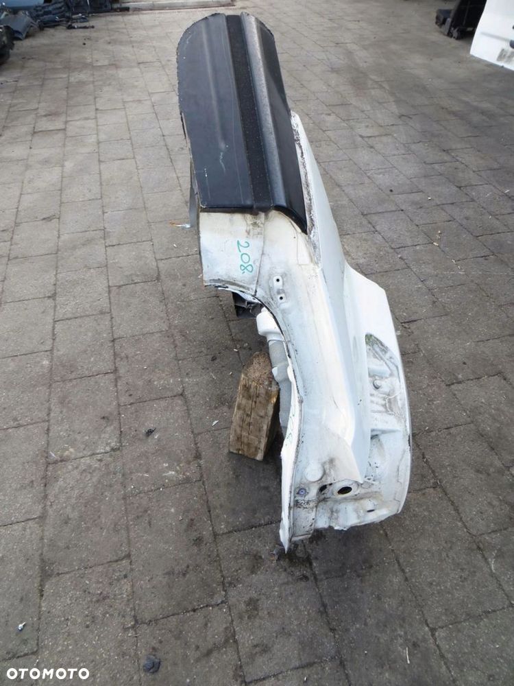 SSANGYONG TIVOLI BŁOTNIK ĆWIARTKA PRAWY TYŁ 14- - 4