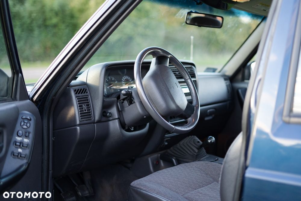 Jeep Cherokee 2.5 Sport - 4
