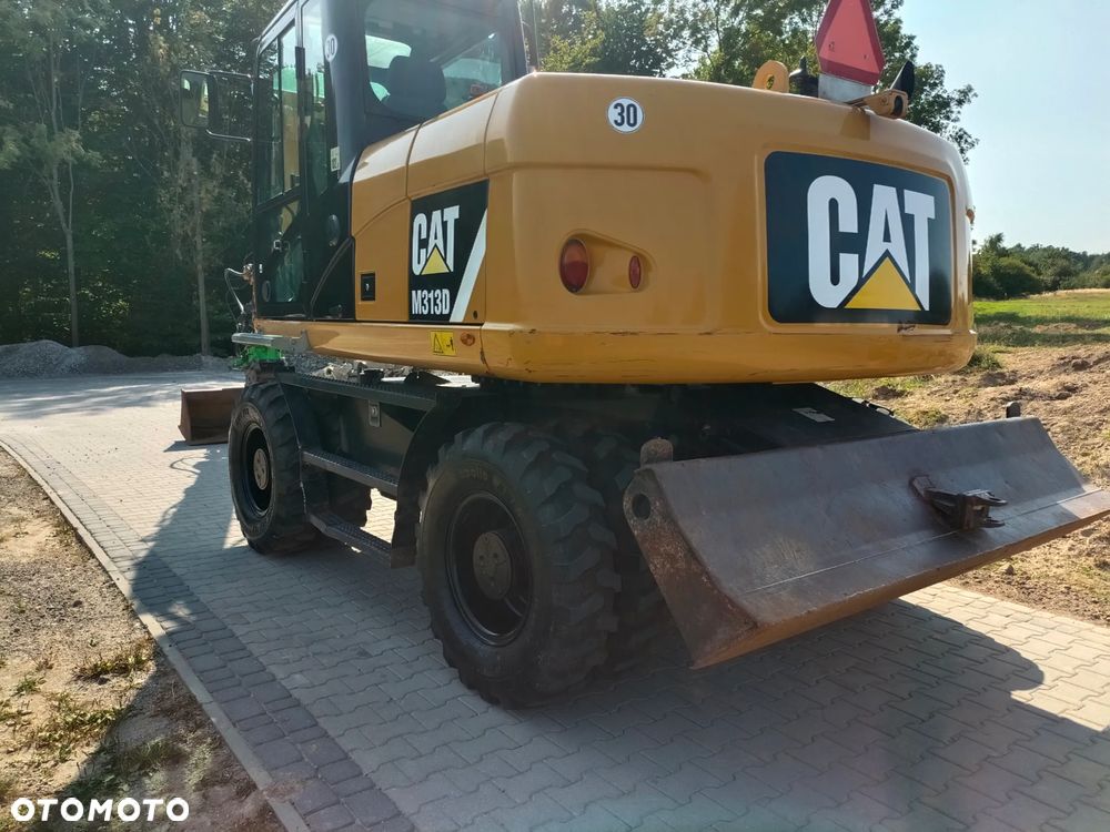 Caterpillar M313D - 4
