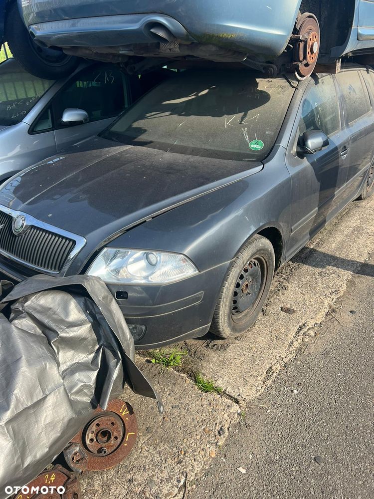 SKODA OCTAVIA II KONSOLA + PASY + PODUSZKI EUROPA - 1