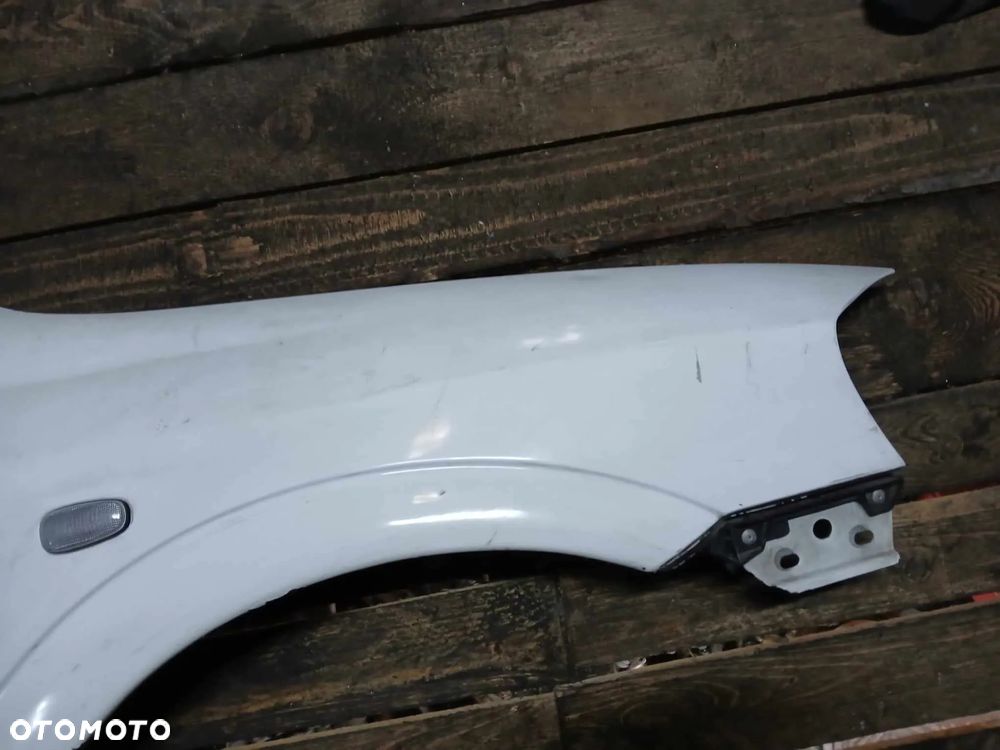 Opel Astra II G Błotnik prawy - 2