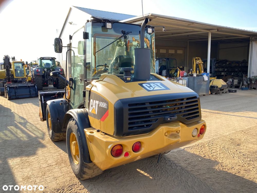 Caterpillar CAT 906H2, 2013 ROK, ŁYŻKA OTWIERANA + WIDŁY, z NIEMIEC, SUPER STAN, - 6