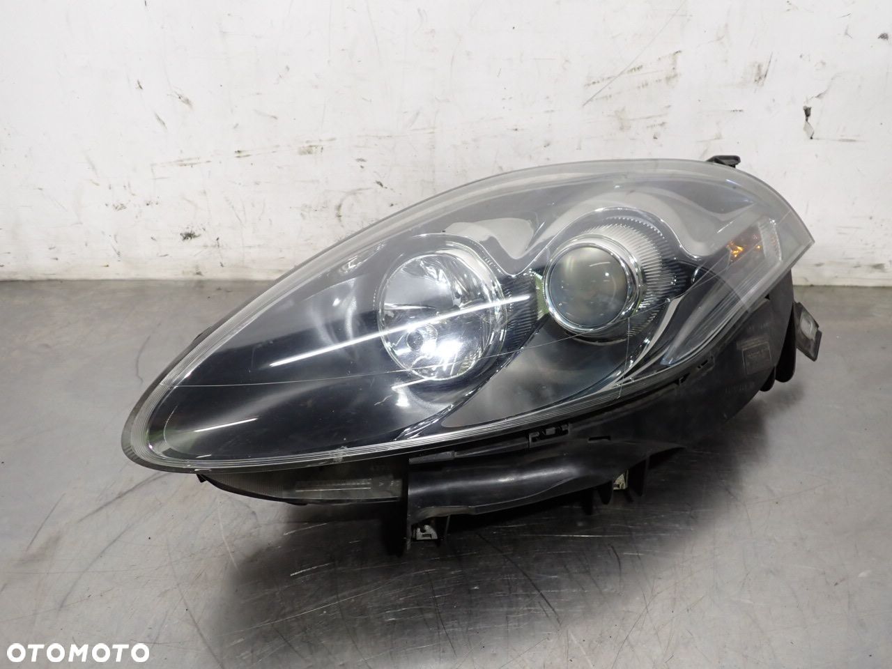 LAMPA LEWA PRZEDNIA SOCZEWKA FIAT BRAVO II LIFT 00518778840 - 1