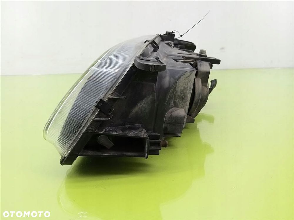 Reflektor lampa przód prawa Mazda 626 V 1997-2000 PRZED LIFT 1305623044 - 8