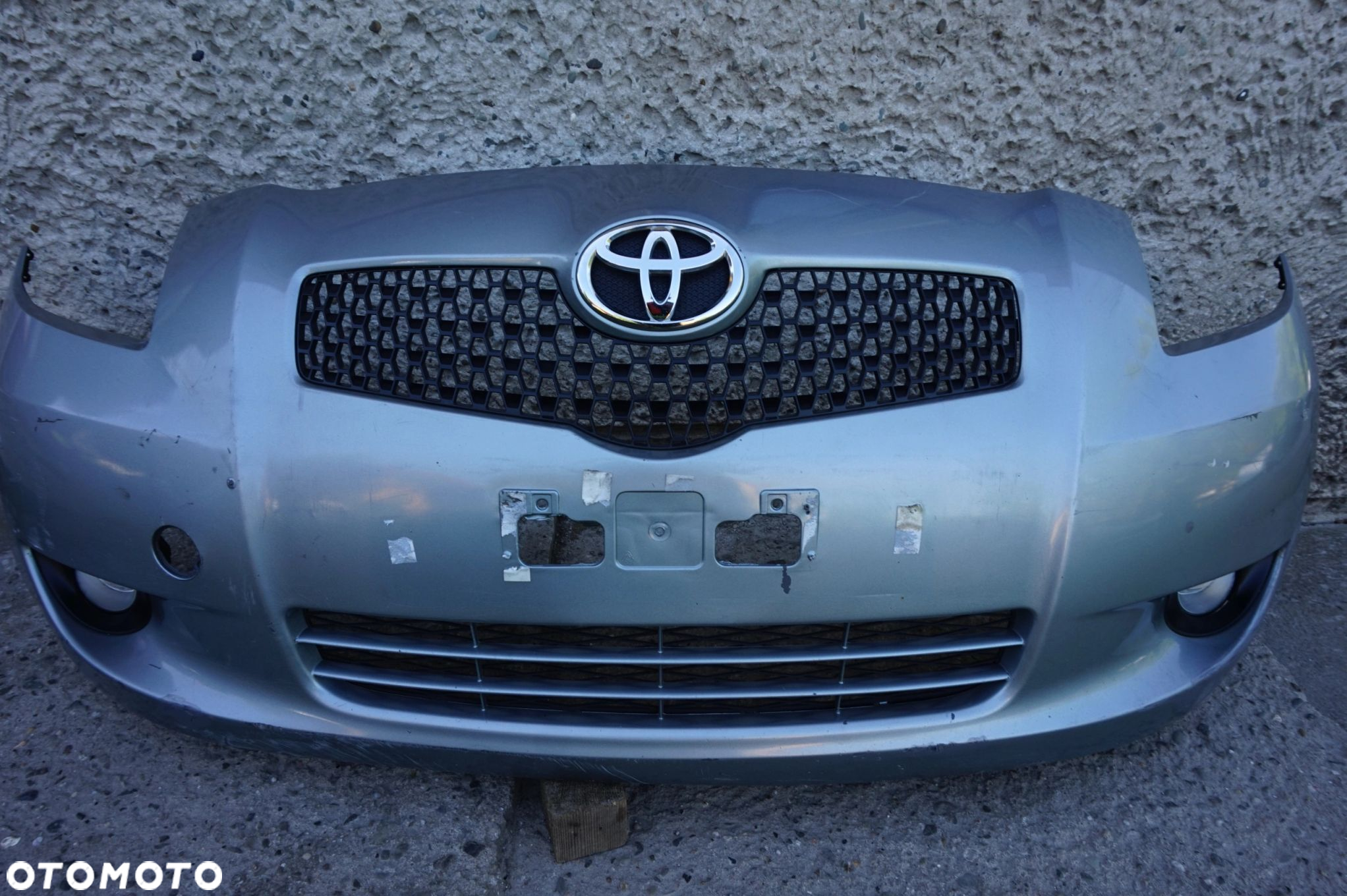 ZDERZAK PRZÓD PRZEDNI TOYOTA YARIS II 05/09r - 2