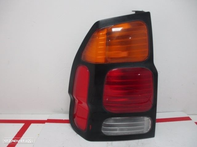 FAROLIM TRASEIRO ESQUERDO MITSUBISHI PAJERO SPORT I 2003 - - 1