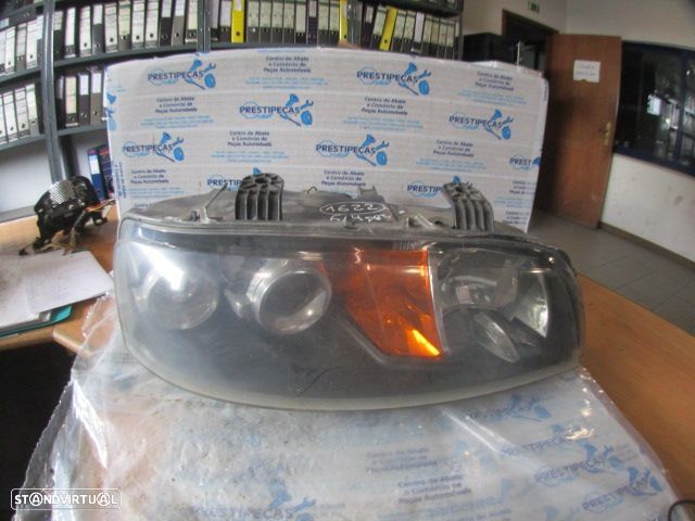 Farol 89100448 FIAT PUNTO 188 2000 1.2I 60CV 5P PRETO DRT H1 + H1 ORIGINAL VALEO - 1