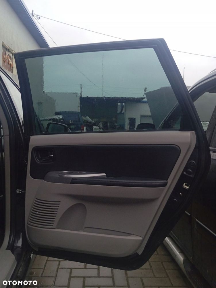 MITSUBISHI GRANDIS DRZWI PRAWE TYLNE TYŁ GOŁE X42 - 2