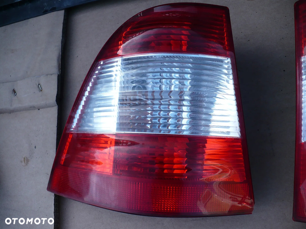 MERCEDES ML W163 LIFT LAMPA LEWA TYL  A1638201964. ORYGI.
