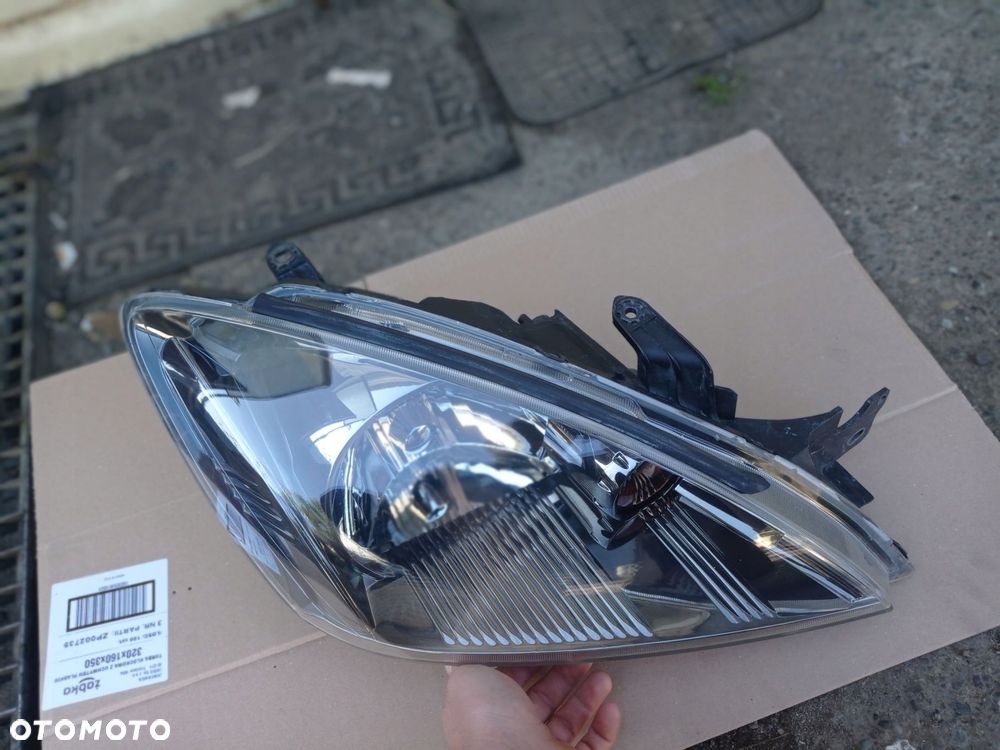 lampa prawa przód mitsubishi lancer vii 03-08 - 2