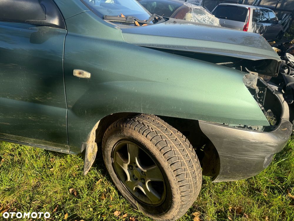 KIA SPORTAGE II 04- BŁOTNIK PRAWY PRZÓD - 1