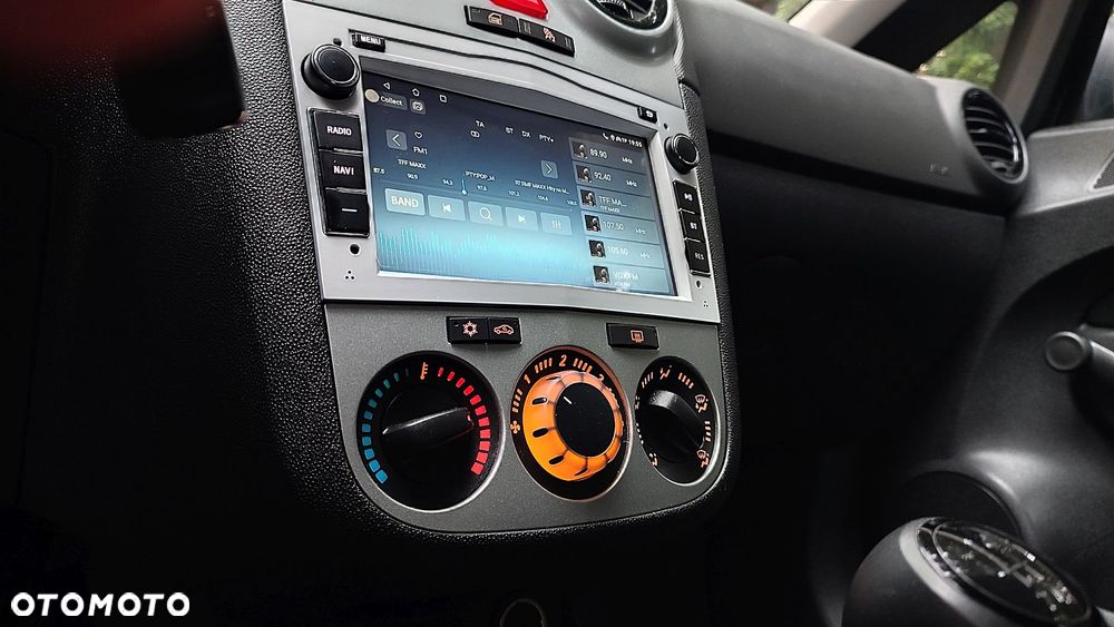 Opel Corsa 1.2 16V Enjoy - 18