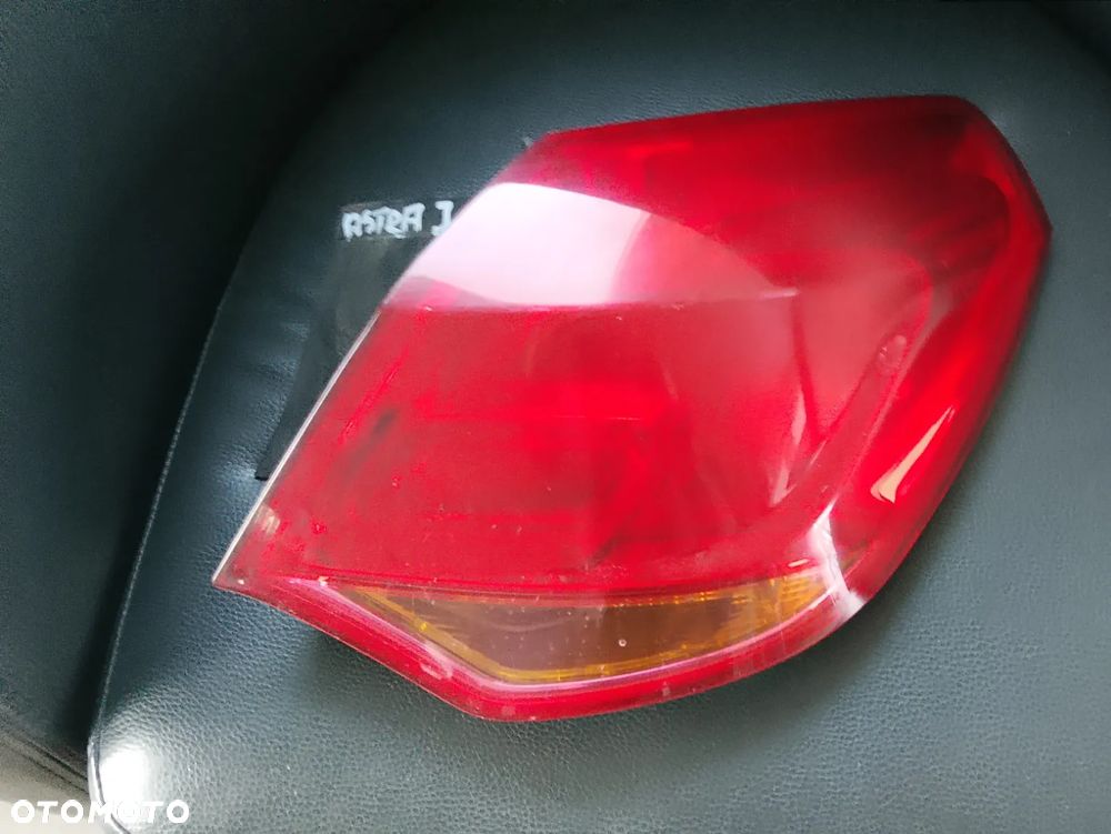 OPEL ASTRA J HB LAMPA PRAWA W BŁOTNIK - 1