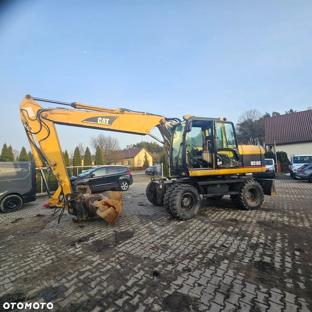 Caterpillar M316C - 8