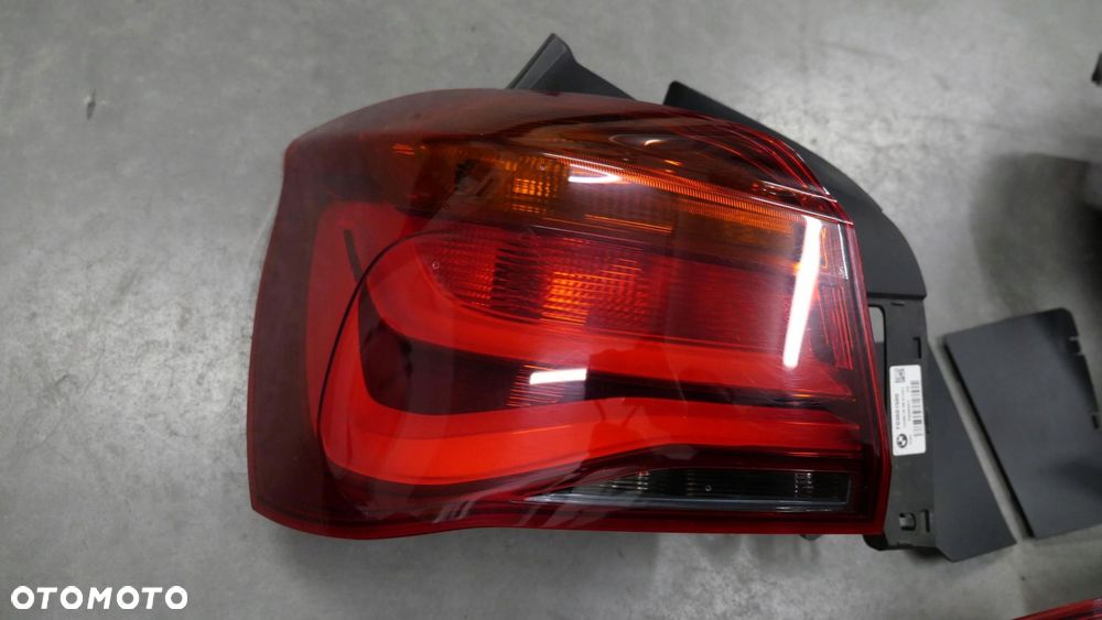 bmw f20 f21 135i 140i lift lampy tył tylne black line 7456502 7456501 - 8