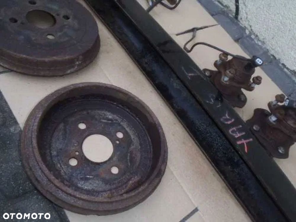 piasta łożysko czujnik abs bęben tył tylne zawieszenie toyota yaris I - 7