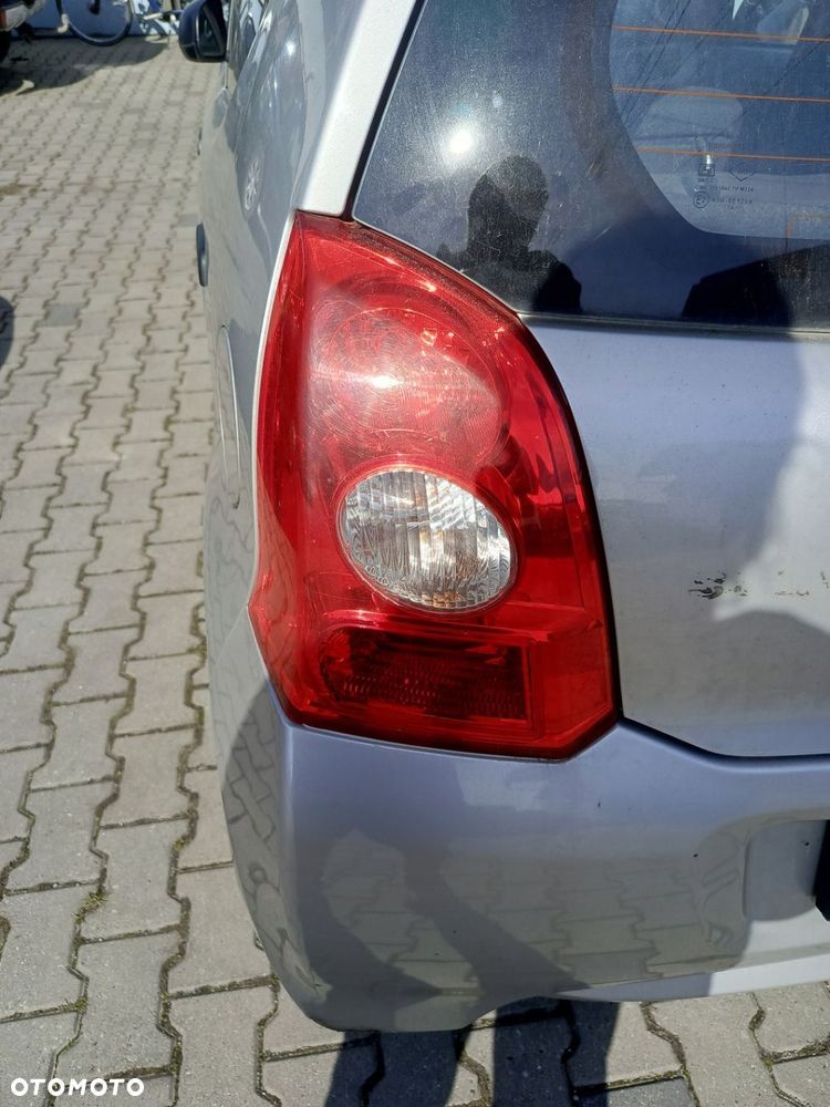 SUZUKI ALTO LAMPA LEWA TYŁ TYLNA EU - 1