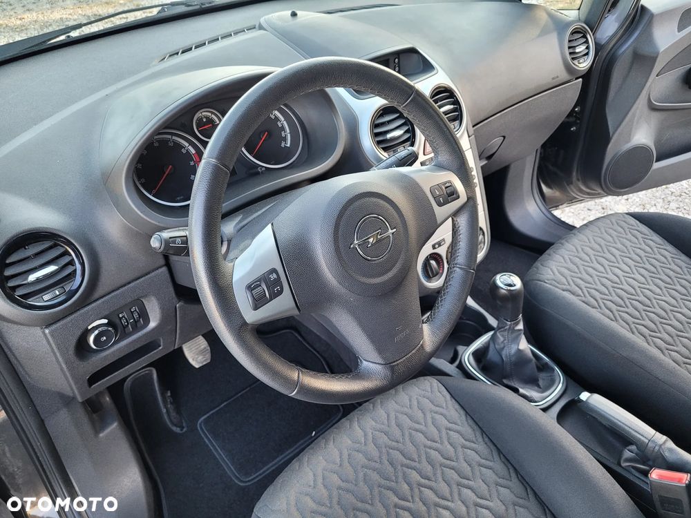 Opel Corsa 1.4 16V Active - 12