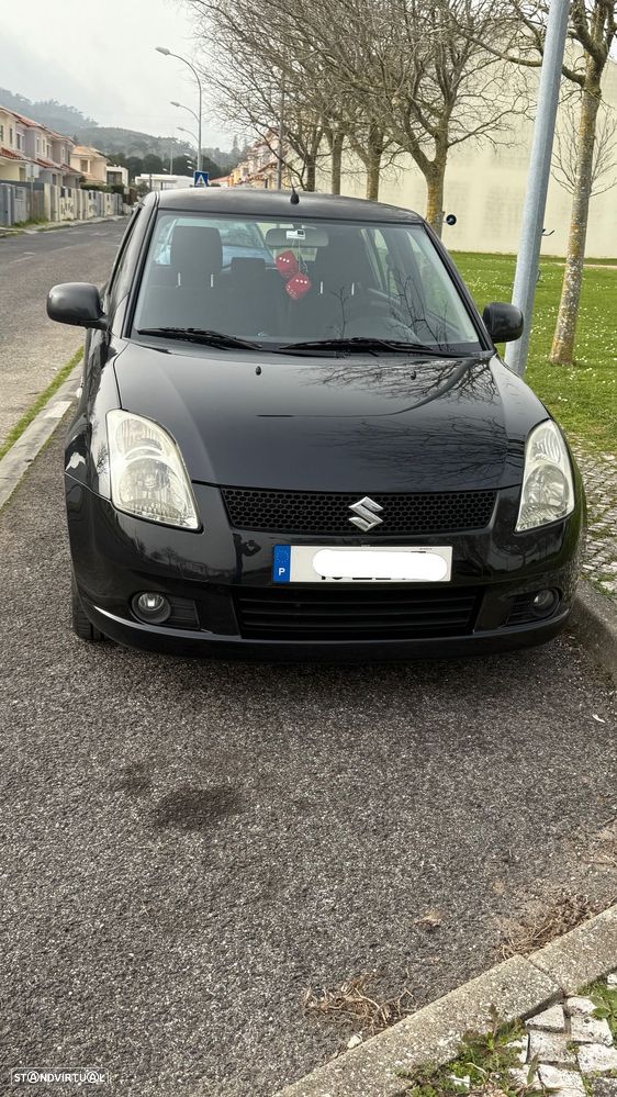 Suzuki Swift 1.3 DDiS GL - 1