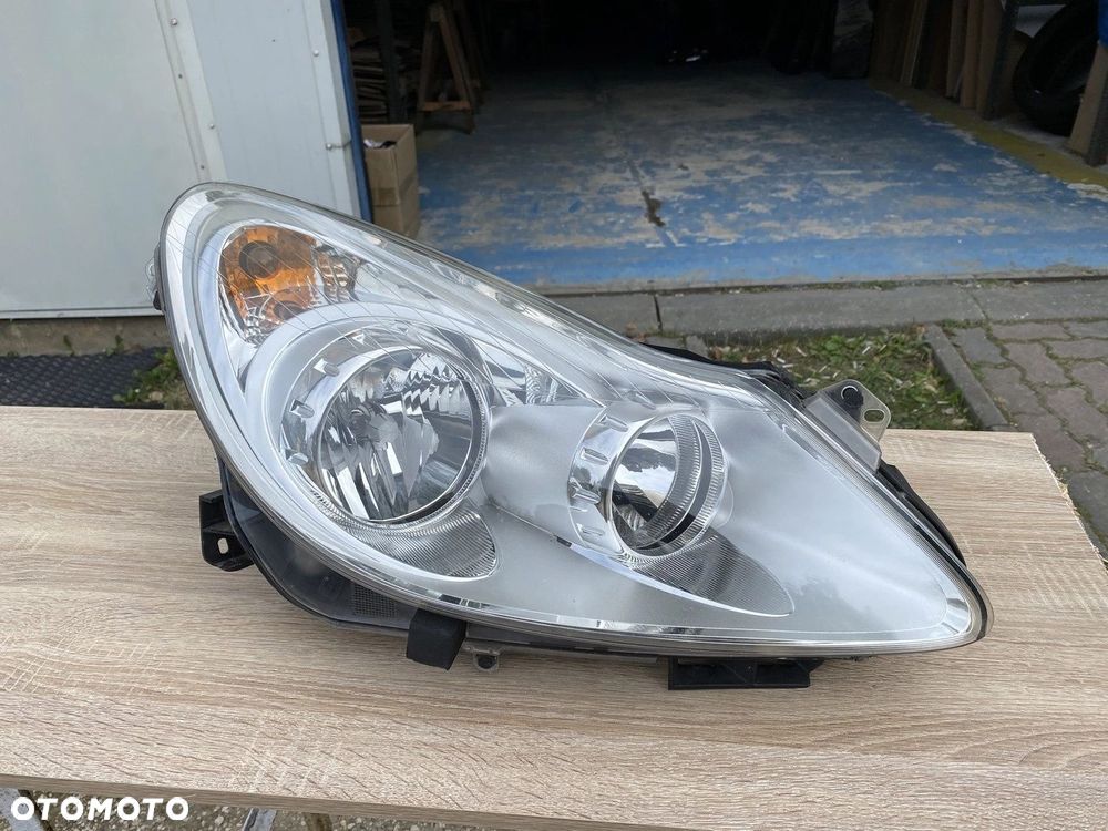 LAMPA PRZEDNIA LEWA OPEL CORSA D 06-11 EUROPA 13186382 - 1