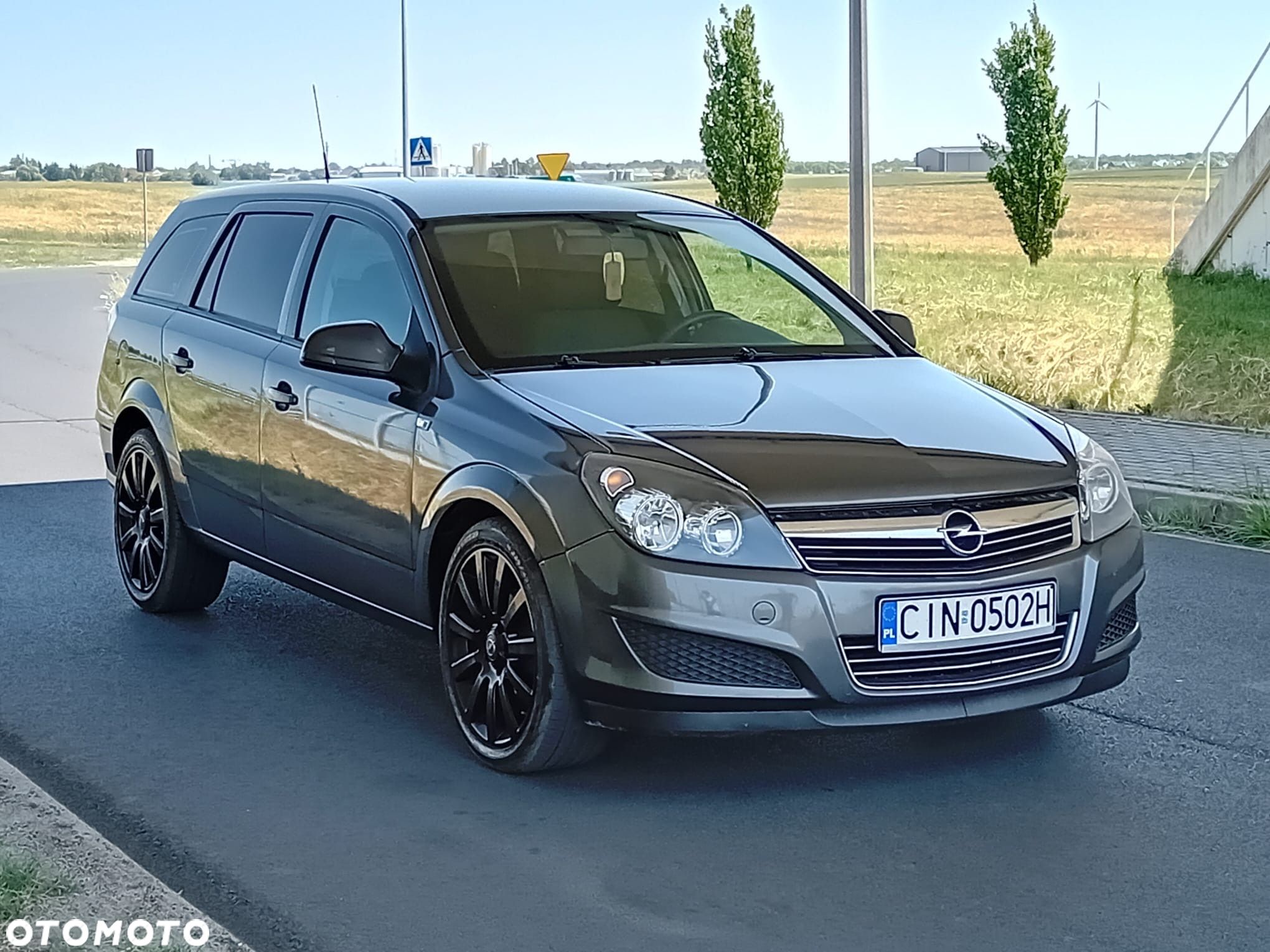 Opel Astra 1.4 Caravan Cosmo - 1