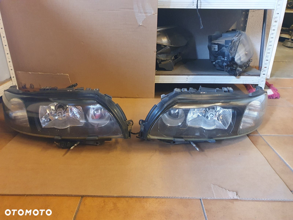 REFLEKTOR L/P VOLVO V70 II 2 XC70 XENON EUROPA