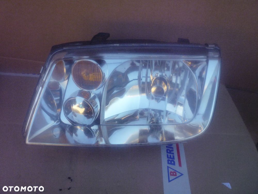 Lampa lewa VW Bora Hella Europa - 1