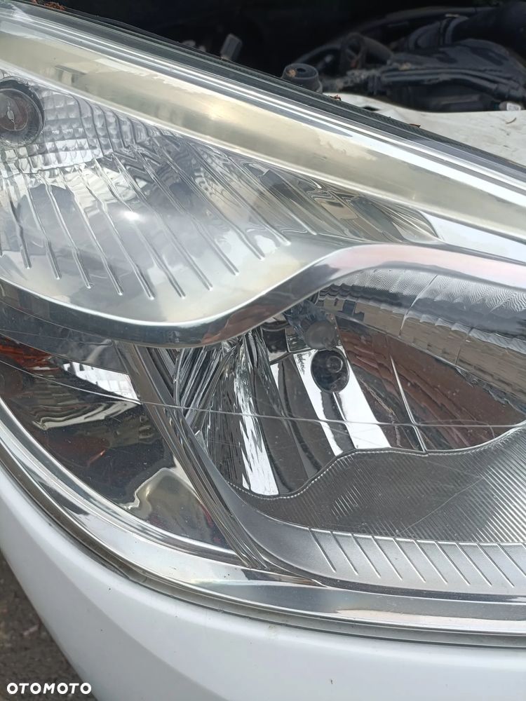 DACIA DOKKER 12-17 2013 r. lampa prawy przód prawa przednia PP EU * - 6