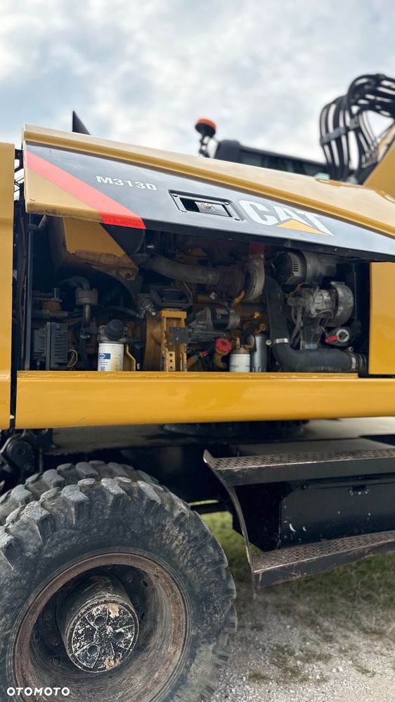 Caterpillar M313D - 7