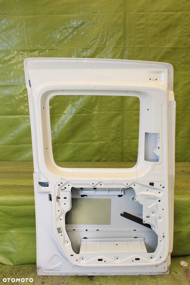 Drzwi Volkswagen Caddy III 2003-2020r. Long Bok Lewy - 2