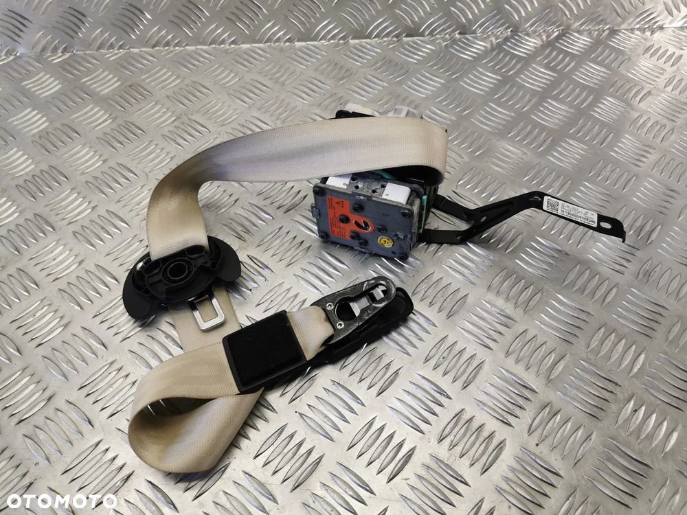 VW TOUAREG 7P 10-18 PAS BEZPIECZENSTWA NAPINACZ  LEWY PRZOD BEZOWY JASNY 7P0577705 E
