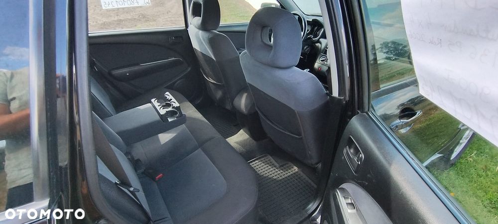 Mitsubishi Outlander 2.0 Comfort 4WD - 14